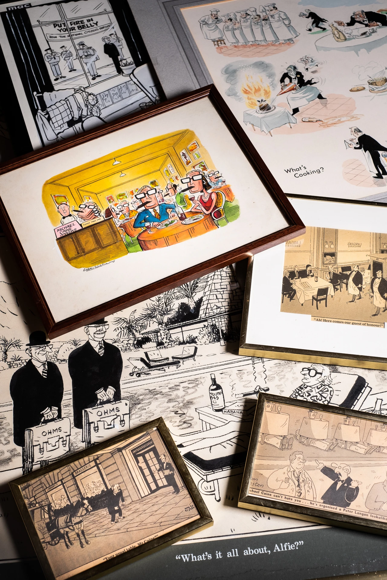 米高．肯恩珍藏一系列諷刺畫畫家David Low（1891～1963）的作品。